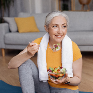 San Jose implant patient eating a salad