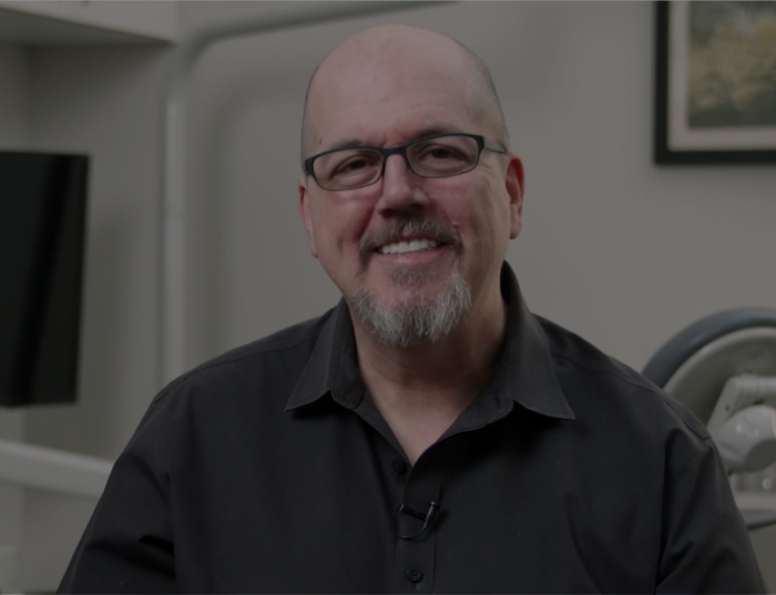 Patient James L. smiling