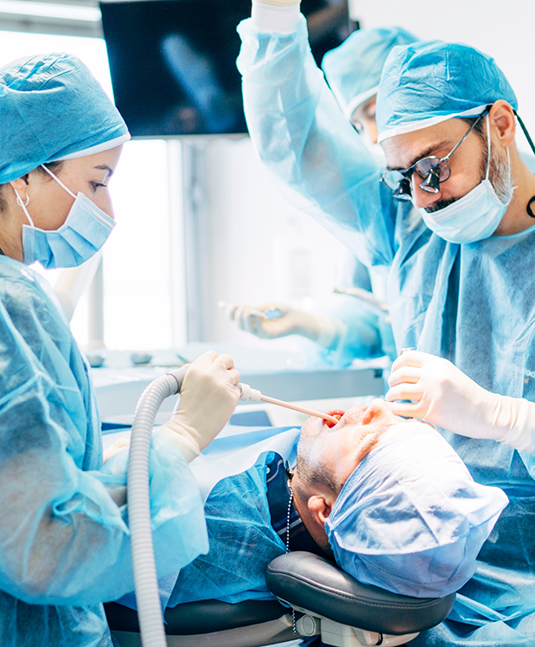Smiling man sitting in dental chair