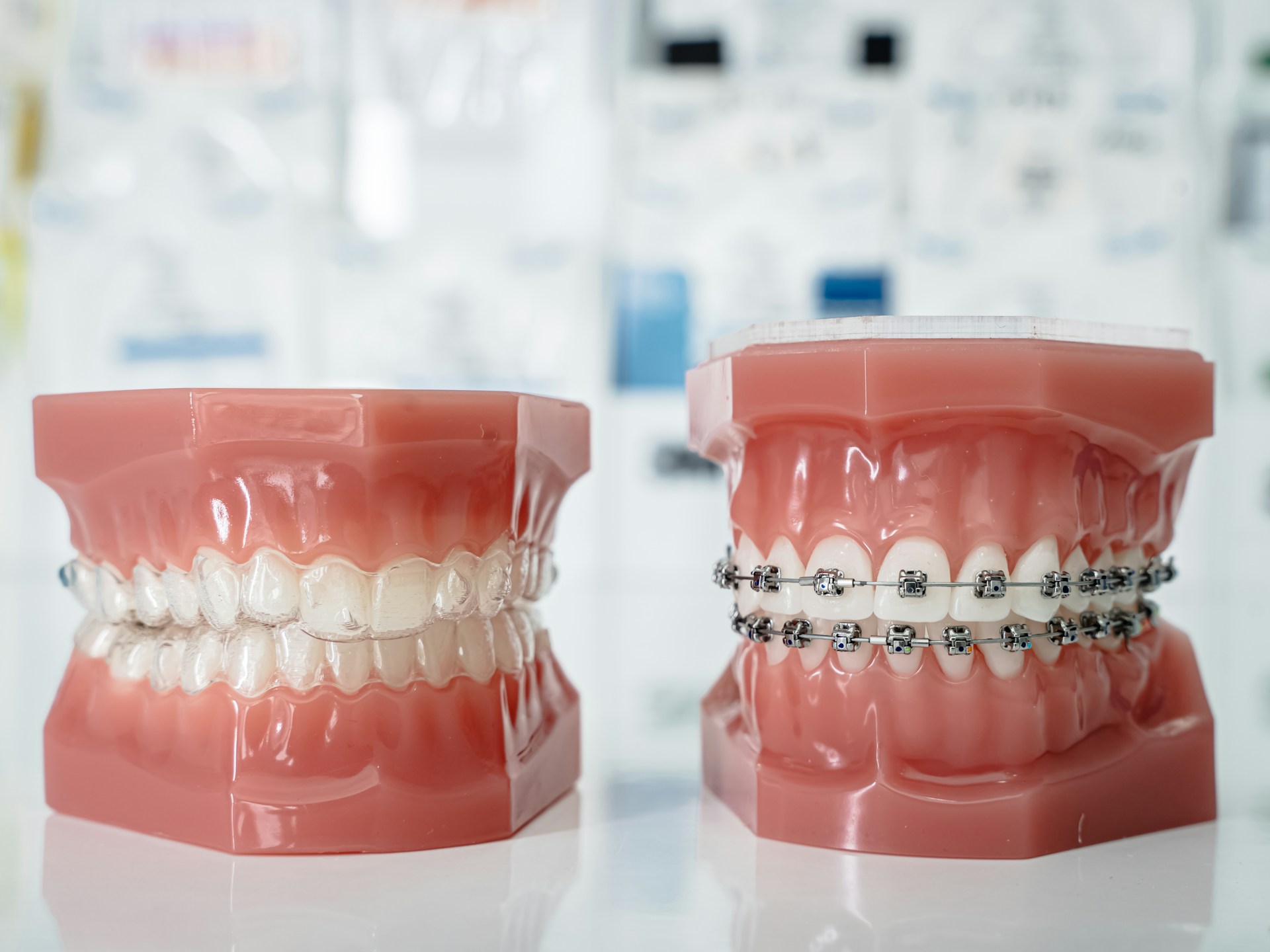 A model of a teeth with braces and braces photo